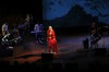 In this Friday, Oct. 7, 2016 photo, Buddhist nun and musician Ani Choying Drolma performs during a concert in Mumbai, India.