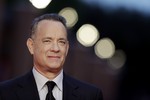 Actor Tom Hanks arrives to receive a lifetime achievement at the Rome Film Festival, in Rome, Thursday, Oct. 13, 2016.