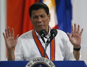 Philippine President Rodrigo Duterte addresses the Philippine Coast Guard during its 115th anniversary celebration which was highlighted by the commissioning of its vessel from Japan the BRP Tubbataha Wednesday Oct. 12, 2016 in Manila, Philippines.