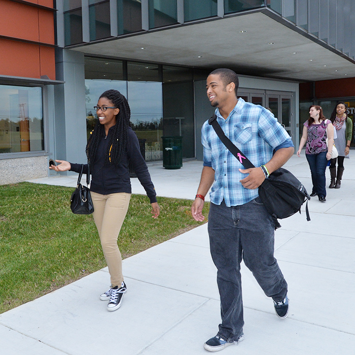 Students walk outside the new TU in Northeastern MD building.