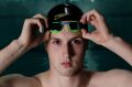 Portrait of Matthew Wilson at Sydney Olympic Aquatic centre, he is studying for his HSC while also competing at the ...
