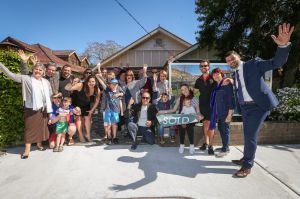 The extended Lynch family [left] celebrate the sale of their family home at 5 Rectory Avenue Ashfield alongside buyers ...