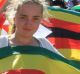 People display flags during the test cricket match between New Zealand and Zimbabwe in Zimbabwe in August.