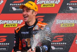 Supercharged: Will Davison celebrates on the Bathurst podium.