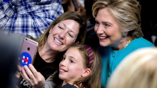 Photo op: Clinton gets a selfie with supporters in Seattle on Friday.