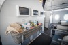 A baby bassinet at a bulkhead of the economy class cabin of a Singapore Airlines A350.