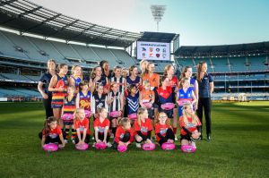 Daisy Pearce (far right) with fellow players and potential future stars at the launch of the AFL women’s league on ...