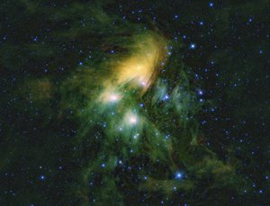 File - This image shows the Pleiades cluster of stars as seen through the eyes of WISE, or NASA's Wide-field Infrared Survey Explorer.