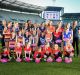 Daisy Pearce (far right) with fellow players and potential future stars at the launch of the AFL women’s league on ...