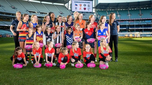 Daisy Pearce (far right) with fellow players and potential future stars at the launch of the AFL women’s league on ...