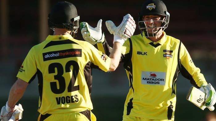 Western Australia’s Adam Voges and Sam Whiteman celebrate victory over Tasmania.