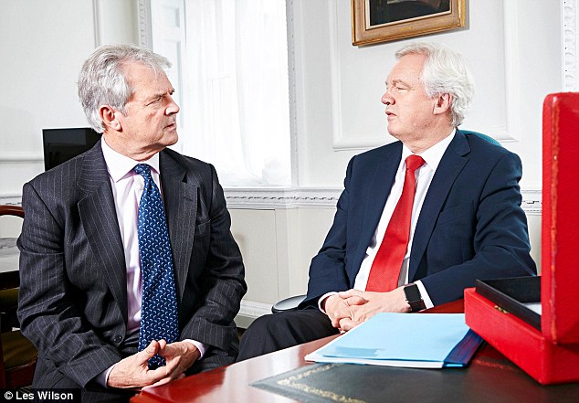 In his first interview since being appointed by Theresa May, Mr Davis (right) told Simon Walters (left) that no one was more shocked than he to receive the Brexit job