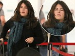 Caption: EXCLUSIVE: **PREMIUM EXCLUSIVE RATES APPLY**Monica Lewinsky is seen for the first time since the Donald Trump sexual assault claims via an old "Access Hollywood" video.  The former White House intern & current activist was seen flying out of LAX.  Lewinsky hasn't changed a bit as she's dressed in blue jeans, leopard print Vans & a black sweater with a green scarf.