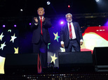Republican presidential candidate Donald Trump, left, stands with Shall Kumar, chairman of the Republican Hindu Coalition, after delivering remarks, Saturday, Oct. 15, 2016, in Edison, N.J. (AP Photo/ Evan Vucci)