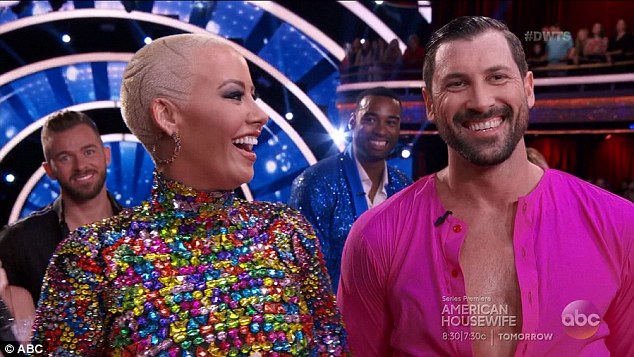 Having a blast: While he is skipping out on season 24, this season, Maksim is paired with Amber Rose; pictured with Amber on the October 10 episode of DWTS