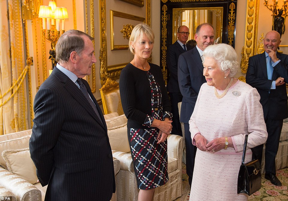 Queen Elizabeth II meets Patron of the Berkshire Red Cross John Nike and Lady de Haan (second left)