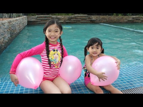 GIANT BALLOONS SURPRISE TOYS Challenge in huge POOL