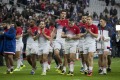 France's players celebrate after winning the Six Nations opener against Italy at Stade de France on Saturday.