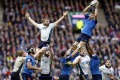 France's Damlen Chouly flies high against Scotland  at Murrayfield on Sunday.