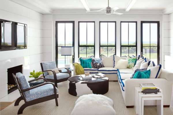 Electric Color    In this Sullivan’s Island, South Carolina, vacation home, the family room's neutral sofa gets instant pizzazz with an electric blue brush fringe from  Samuel &amp; Sons . "Brush fringe used as welting turns out to be fresh and fun—and electric blue is my new favorite color," designer Sally Markham says. The room is completed with vintage Russel Wright chairs upholstered in Meloire Reverse by  China Seas  and a  Calypso Home  floor pillow.