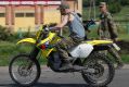 Arsen Pavlov, also known as Motorola, rides a bike at a checkpoint in eastern Ukraine. 