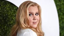 FILE - In this Dec. 3, 2015, file photo, Amy Schumer arrives at the GQ Men of the Year Party at the Chateau Marmont in ...