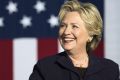 Hillary Clinton, 2016 Democratic presidential nominee, smiles before speaking during a campaign event in Columbus, Ohio, ...