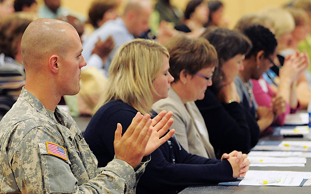 Veteran at a conference with civilian attendees