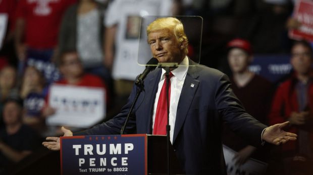 Donald Trump is seen through a teleprompter as he speaks during a campaign event in Cincinnati, Ohio.