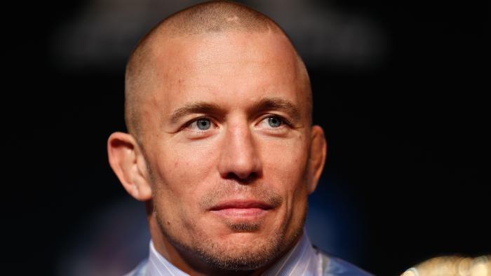 LAS VEGAS, NV - NOVEMBER 14: UFC welterweight champion Georges St-Pierre interacts with media during the final UFC 167 pre-fight press conference inside the Hollywood Theatre at the MGM Grand Hotel/Casino on November 14, 2013 in Las Vegas, Nevada. (Photo by Josh Hedges/Zuffa LLC/Zuffa LLC via Getty Images)