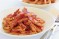 Red pesto penne with prosciutto