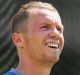 MELBOURNE, AUSTRALIA - DECEMBER 23: Peter Siddle reacts to fans during an Australian nets session at the Melbourne ...