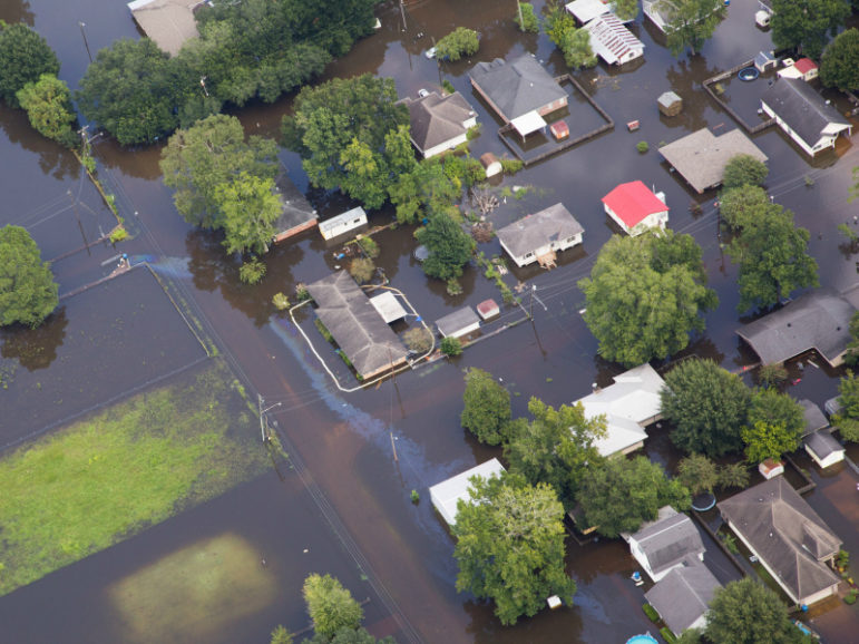 Contaminated floodwaters inundate a neighborhood in Sorrento, Louisiana, August 17, 2016. Photo credit: Louisiana Environmental Action Network/© Jeffrey Dubinsky/Handout via Reuters