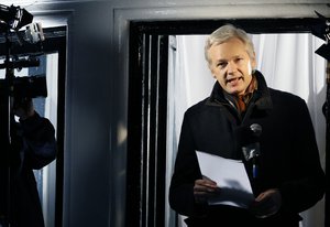 In this Thursday, Dec. 20, 2012, file photo, Julian Assange, founder of WikiLeaks speaks to the media and members of the public from a balcony at the Ecuadorian Embassy in London.