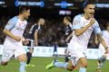 Cometh the hour: Tim Cahill races towards the corner flag for his trademark celebration after his wonder strike.