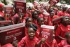 FILE- In this Tuesday, April. 14, 2015 file photo, young girls known as Chibok Ambassadors, carry placards bearing the names of the girls kidnapped from the government secondary school in Chibok, two years ago, during a demonstration, in Abuja, Nigeria.