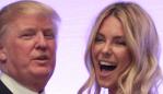 Businessman Donald Trump gives former Miss Universe Jennifer Hawkins a hug, after she introduced him as the guest speaker at the National Achievers Conference at the Sydney Entertainment Centre in Darling Harbour, Sydney.