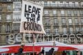 An activist holds up a poster during a demonstration.