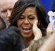 First Lady Michelle Obama meets with supporters after speaking at a campaign rally for Democratic presidential candidate ...