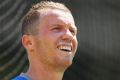 MELBOURNE, AUSTRALIA - DECEMBER 23: Peter Siddle reacts to fans during an Australian nets session at the Melbourne ...