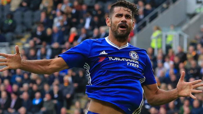 Chelsea's Brazilian-born Spanish striker Diego Costa celebrates after scoring their second goal during the English Premier League football match between Hull City and Chelsea at the KCOM Stadium in Kingston upon Hull, north east England on October 1, 2016. / AFP PHOTO / Lindsey PARNABY / RESTRICTED TO EDITORIAL USE. No use with unauthorized audio, video, data, fixture lists, club/league logos or 'live' services. Online in-match use limited to 75 images, no video emulation. No use in betting, games or single club/league/player publications. /