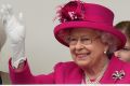 Britain's Queen Elizabeth II waves to guests during the Patron's Lunch in The Mall, central London in honour of the her ...