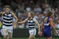 Laughing all the way to the siren: Cameron Guthrie of the Cats is all smiles after scoring.