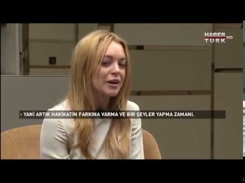 Lindsay Lohan Attacked for reading Quran