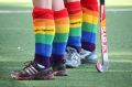 Hockey players wear rainbow socks during the "Fair go, sport!" campaign. 