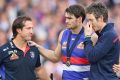 Beveridge with Easton Wood and Bob Murphy as the post-match celebrations kick off.