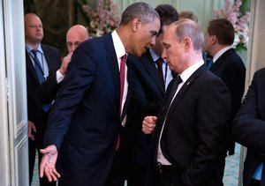 File - US President Barack Obama talks with Russian President Vladimir Putin after a lunch with other foreign leaders to commemorate the 70th anniversary of D-Day in Normandy, France, 6 June, 2014.