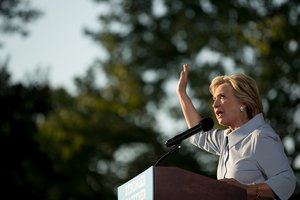 Democratic presidential candidate Hillary Clinton waves as she finishes speaking at the annual Salute to Labor at Illiniwek Park Riverfront in Hampton, Ill., Monday, Sept. 5, 2016.