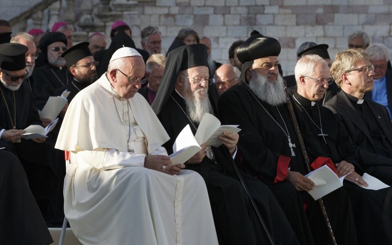 Pope Francis attends an interfaith peace gathering outside the Basilica of St Francis in Assisi, Italy (CNS photo/Paul Haring)