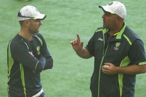 Stuck indoors: Michael Clarke and Darren Lehmann speak during the Australian nets session at the National Cricket Centre ...